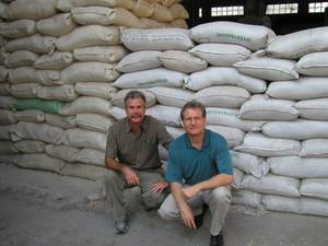 Josef and Tom purchase vitamin-enriched porridge for Africans. 